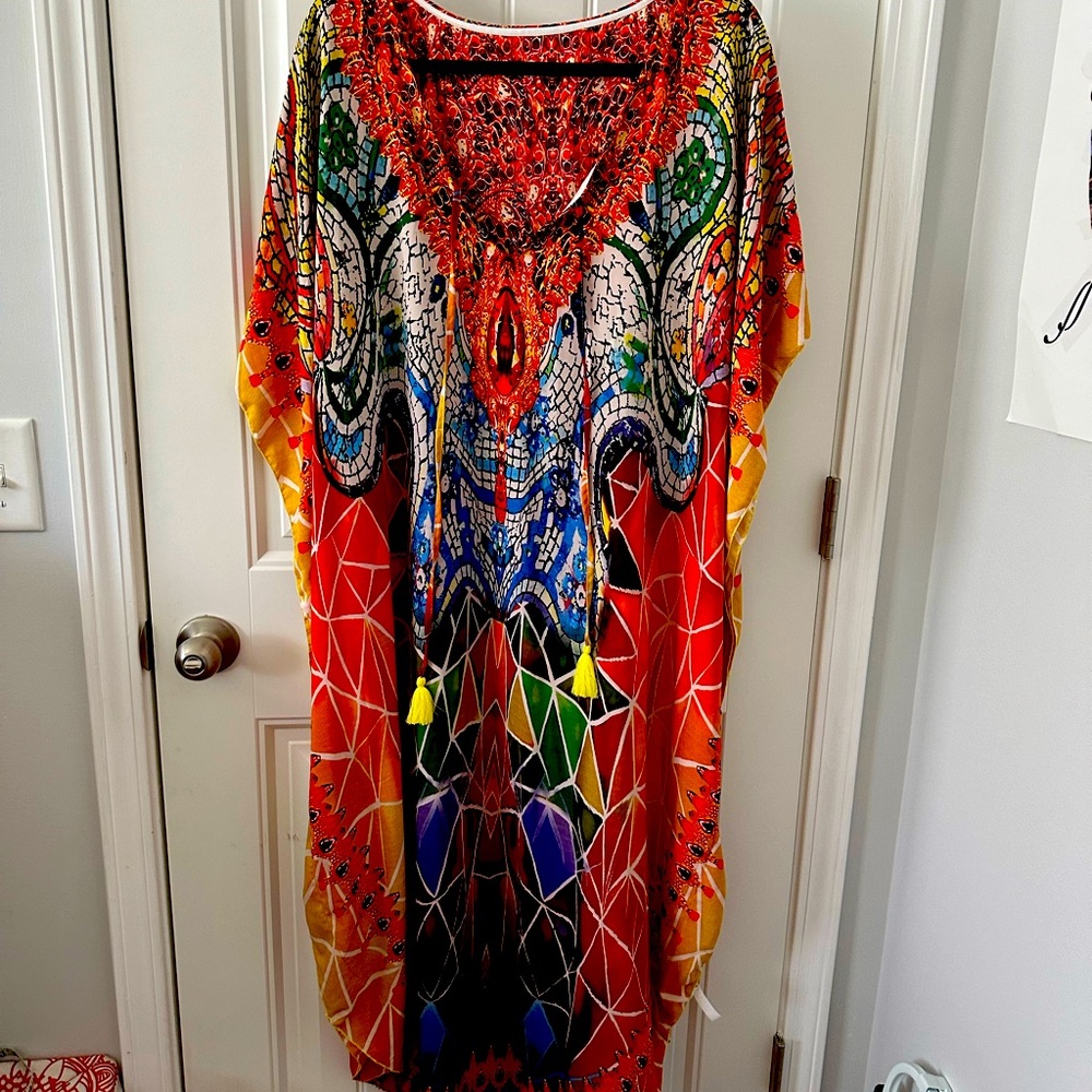 Caftan in reds and oranges . One size fits all.